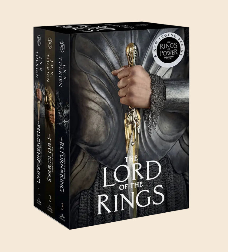 Lord of the Rings 3-book paperback box set with dark fantasy art slipcase and "Rings of Power" sticker.