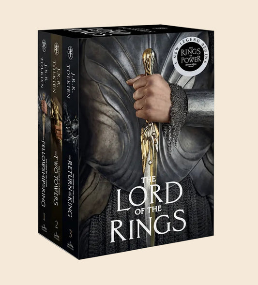 Lord of the Rings 3-book paperback box set with dark fantasy art slipcase and "Rings of Power" sticker.