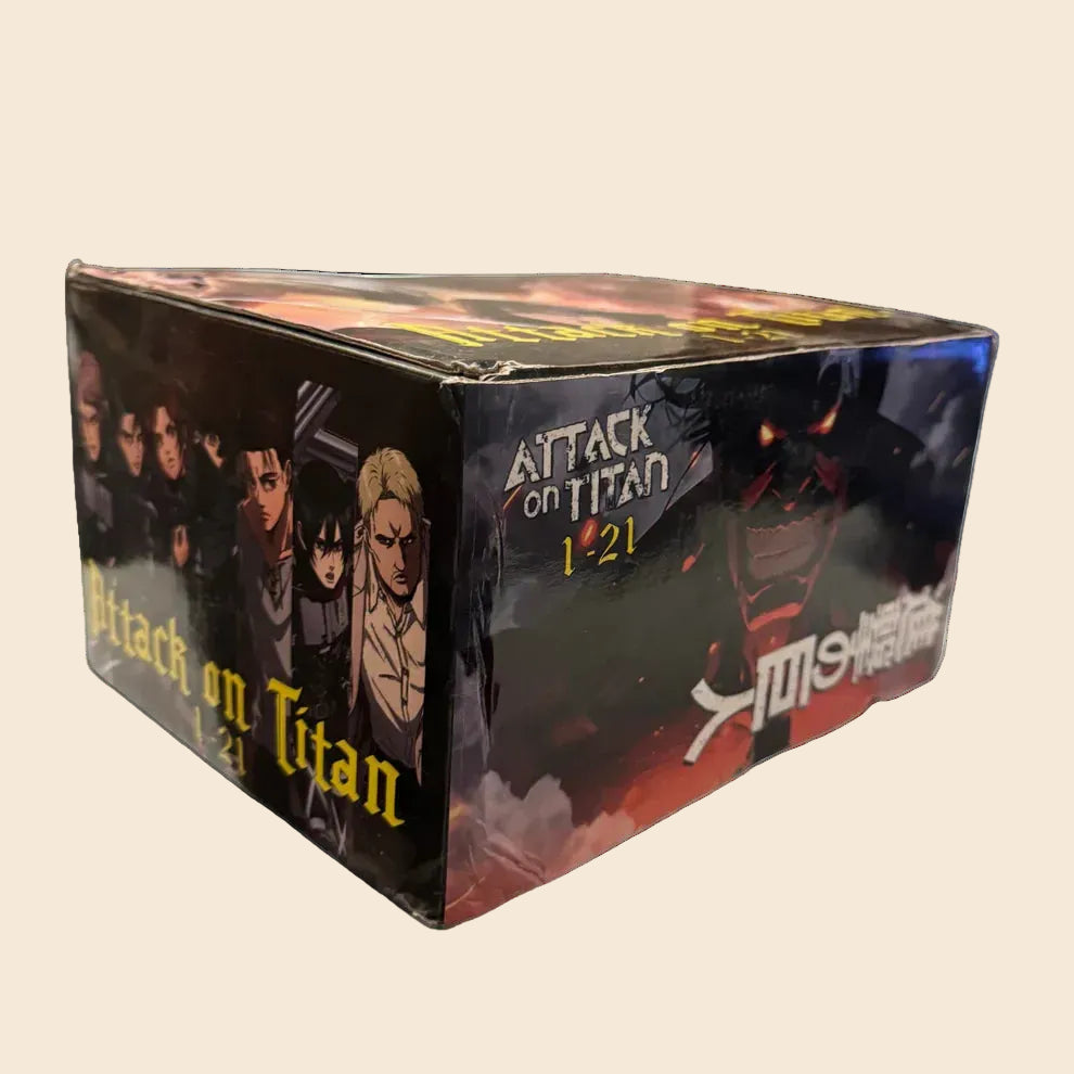Attack on Titan 21-book paperback manga box set with dark, dramatic character art on a sturdy slipcase.