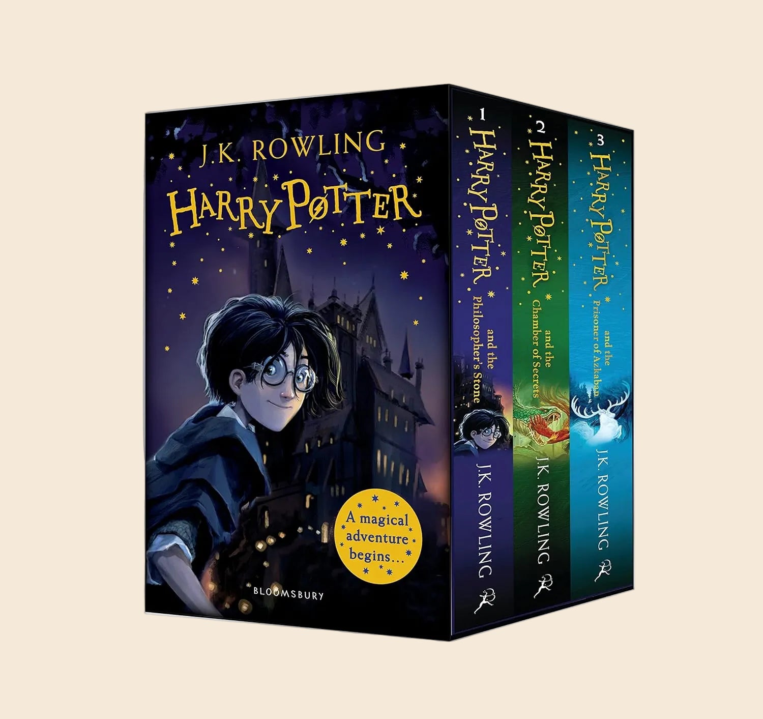 Harry Potter 3-book paperback box set with colorful covers and slipcase, featuring young Harry and Hogwarts.