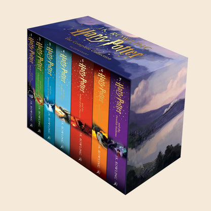Harry Potter 7-book paperback box set in a blue slipcase with a Hogwarts landscape design.