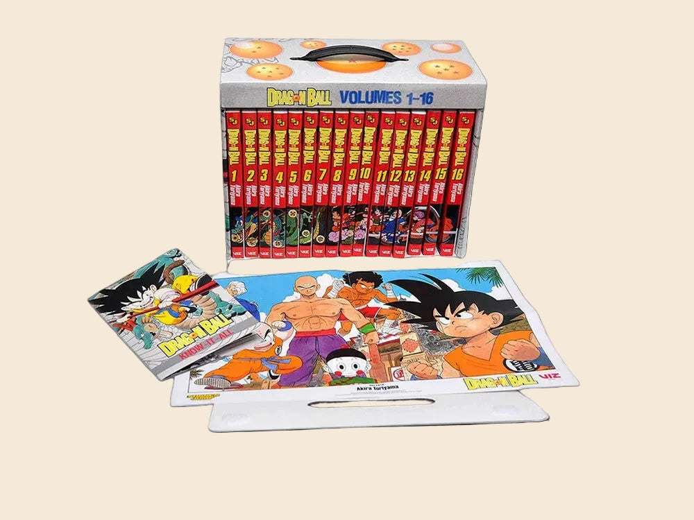 Dragon Ball Complete Box Set with 16 red paperback manga volumes, a poster, and a booklet.