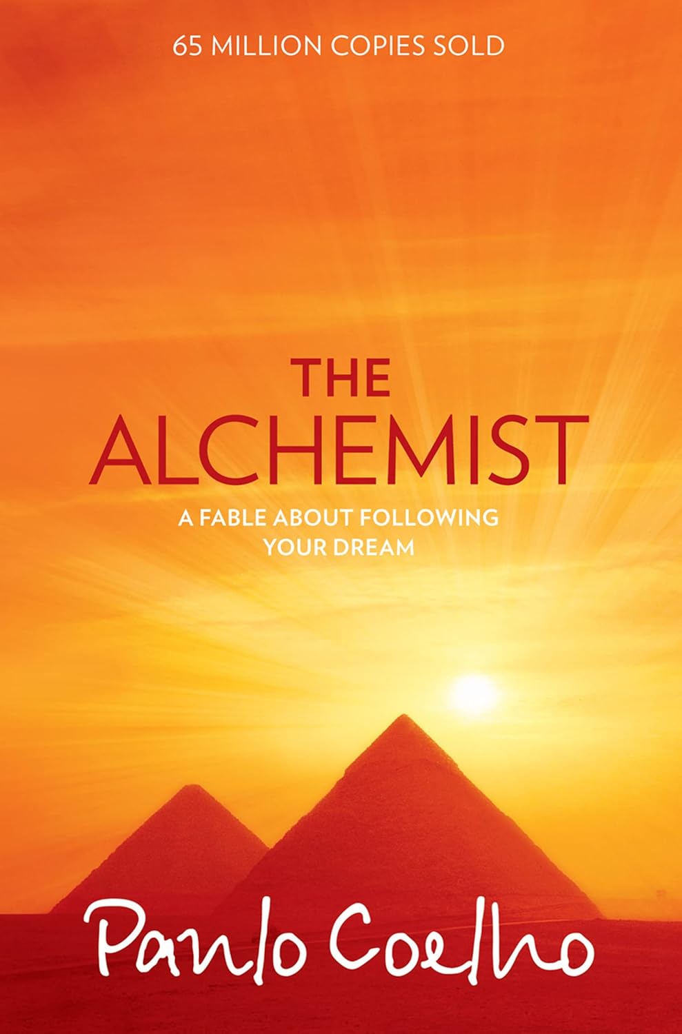 The Alchemist by Paulo Coelho, paperback book cover.